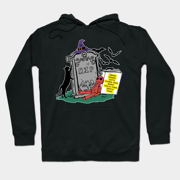 illustration of a graveyard tombstone and elements of witches represents a spell in process. Hoodie by JENNEFTRUST